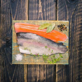 Trout fillets on a chopping board