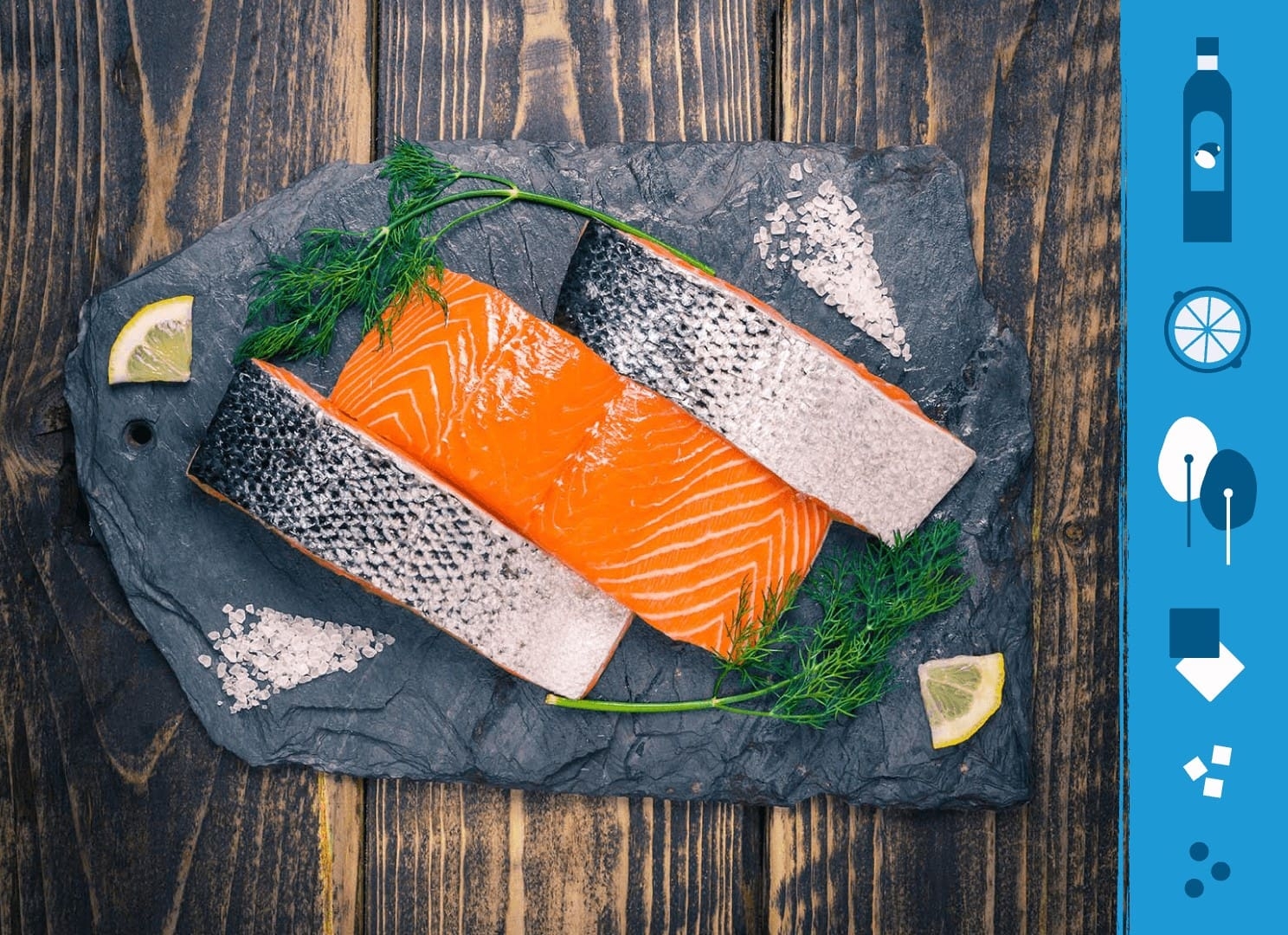 Salmon fillets on a slate background next to illustrations of the ingredients needed to make salmon and spinach